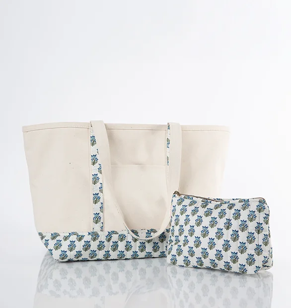 Quilted block print clutch with wrist strap