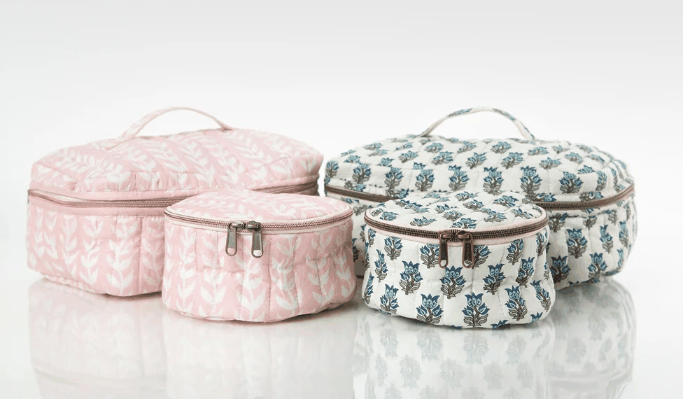 Quilted block print cosmetic pouches in pink and blue