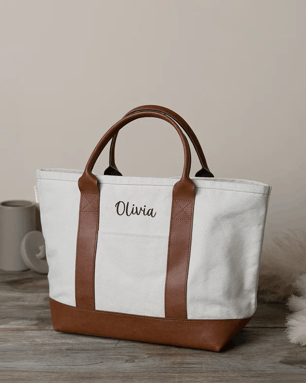 The Kind Leather Tote in natural canvas with leather handles