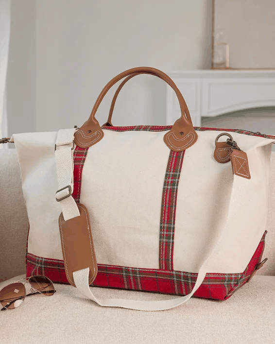Plaid collection canvas totes on a wooden ladder