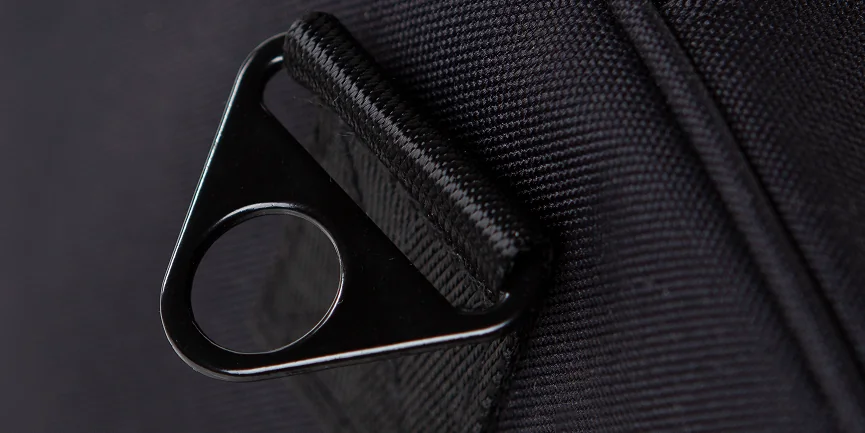 Metal D-ring and reinforced canvas texture detail