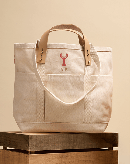 Icon embroidery on the front of a tote bag